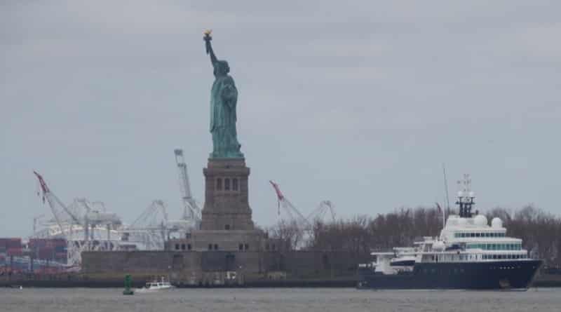 The yacht of Russian billionaire, blocking the view of the Statue of Liberty