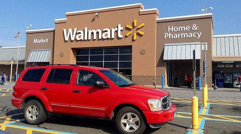 Employees of Wal-Mart deliver orders on the way home