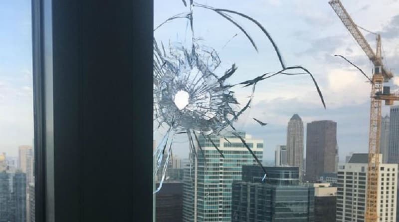 A random bullet pierced the window of a house on 56th floor