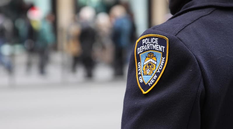 Posing as policemen, two women robbed a Manhattan apartment