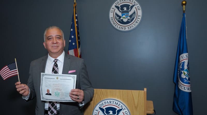 A police officer from Chicago, and served for 21 years and only recently became a US citizen