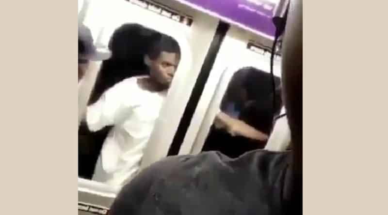 Daredevil ride the subway outside of the car (video)
