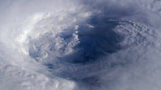 On what principle do hurricanes get their names?