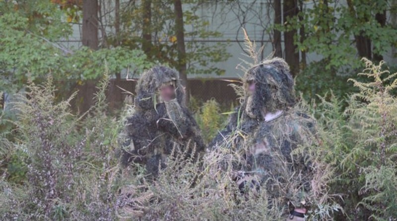 In new Jersey Teens in the Park disguised as bushes and scare people (photo)