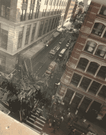 Above the entrance to the subway in Manhattan collapsed scaffolding: there are victims