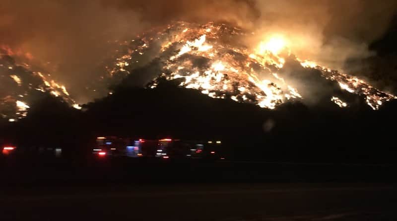 In Los Angeles the fire had moved into the house and close to freeway 405