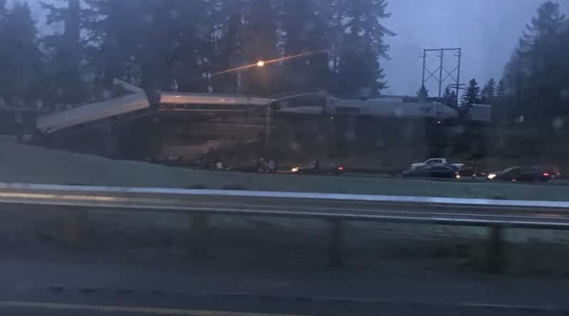 Passenger Amtrak train crashed on the overpass in Washington (photos)