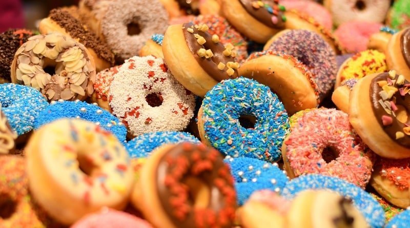 Champion eating doughnuts was arrested for breaking… Dunkin’ Donuts