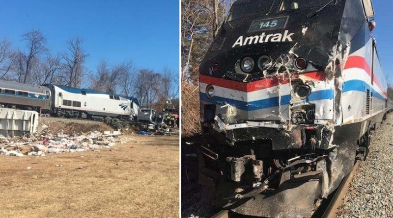 Train with congressmen collided with a truck.