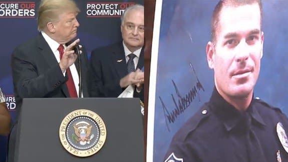 Donald trump put the autographs on the photos of people killed by illegal immigrants