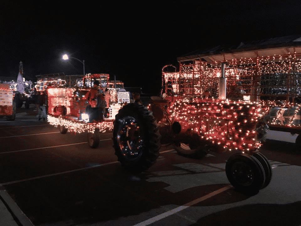 Unusual show in Greenwich parade of Christmas lights on tractors…