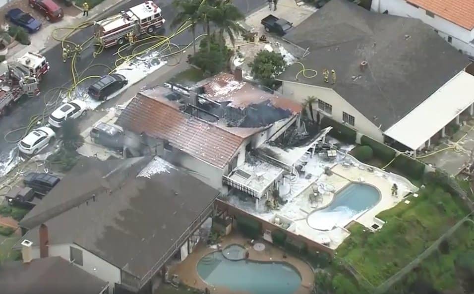 In California, a twin-engine plane crashed in a residential area, causing massive fire