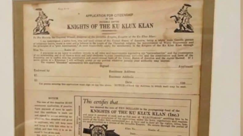 Officer placed on leave after the buyer is African-American, found the statement of the Ku Klux Klan in his home