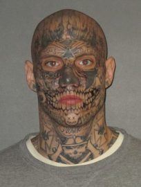 Counsel for the accused in double homicide is looking for jurors who will judge him by the tattoos on his face
