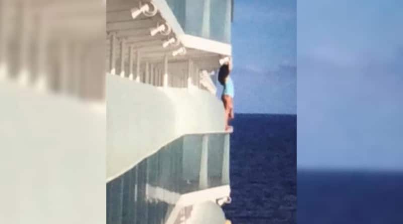 A huge passenger cruise ship climbed over the balcony railing to take a selfie
