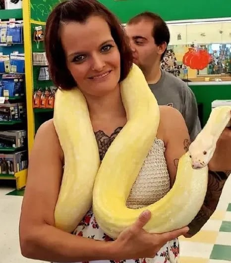 The mother of two children strangled by a Python in the house with 140 snakes