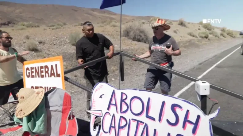 Protesters blocked the entrance to the Burning Man festival. What is the reason?